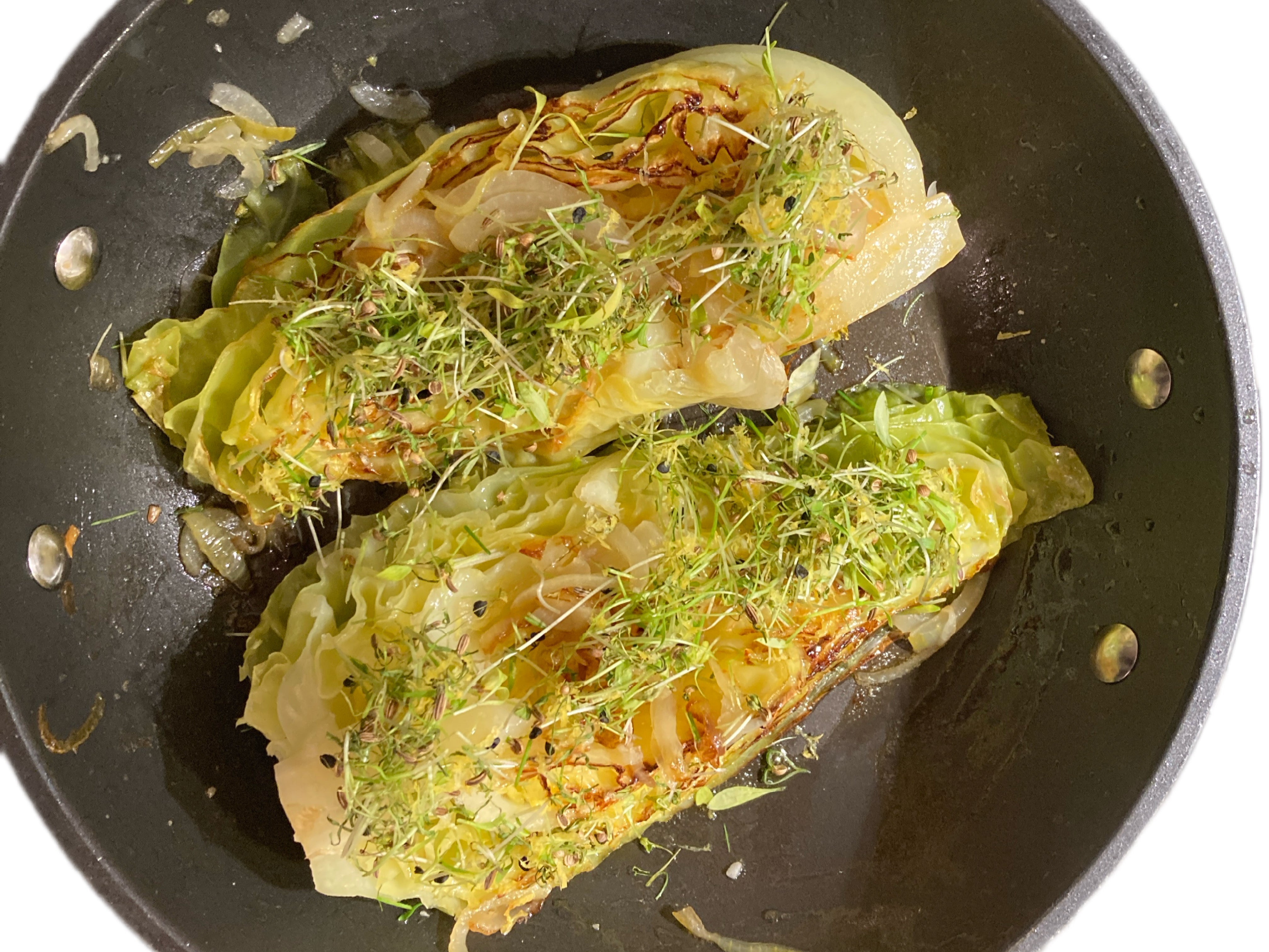 Stegt spidskål med dild og hvidløgsspirer